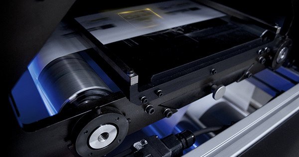 Heavy-duty Spartanics converting equipment detail with optical registration sensor